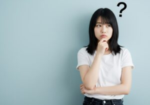 根管治療を中断しようか考えている女性