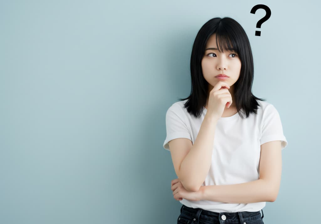 根管治療を中断しようか考えている女性