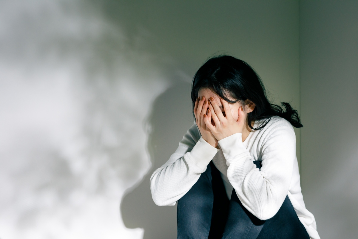 歯科恐怖症を感じている女性